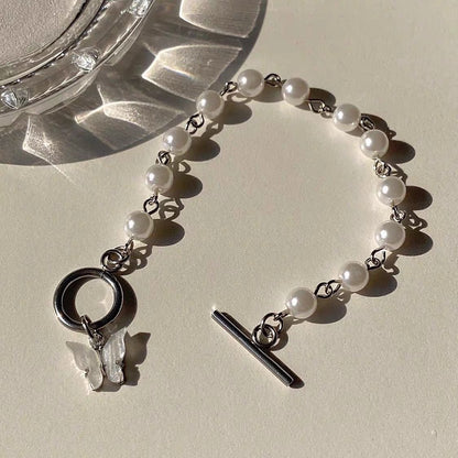 Bracelet de perles avec pendentif papillon électrolytique