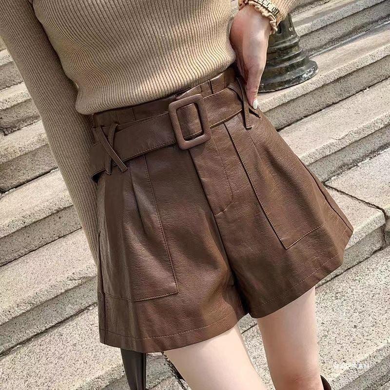 Pantalones versátiles de piel de talle alto para mujer