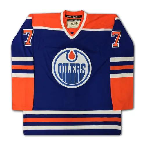 Paul Coffey Career Jersey Autographed LTD ED 199, Edmonton Oilers blue/orange jersey with Oilers logo and 7 on sleeves