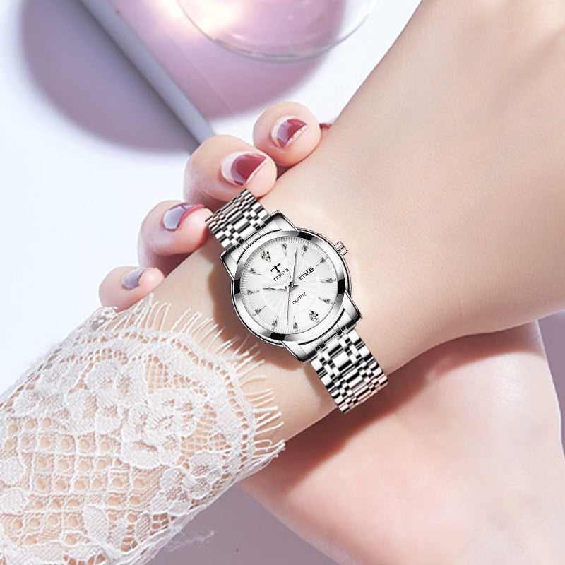 Pequeño y exquisito reloj de cuarzo impermeable luminoso sencillo para mujer