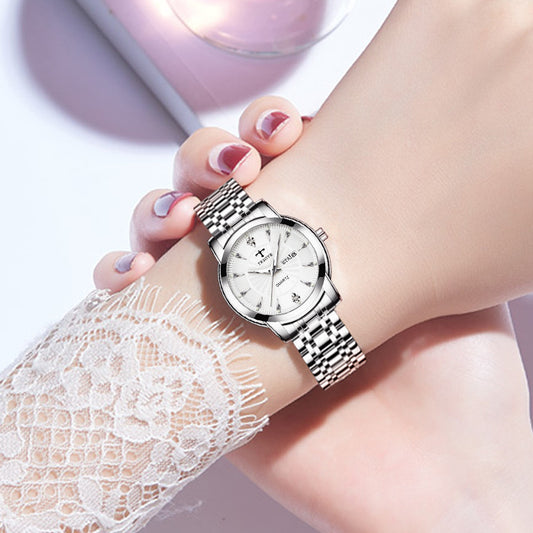 Petite et exquise montre à quartz étanche lumineuse pour femme