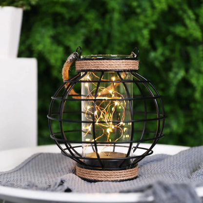 Battery-powered table lamp with hemp rope cage and warm fairy lights, by JHY DESIGN