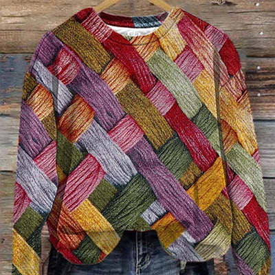 Pull femme à manches longues raglan, col rond et imprimé patchwork