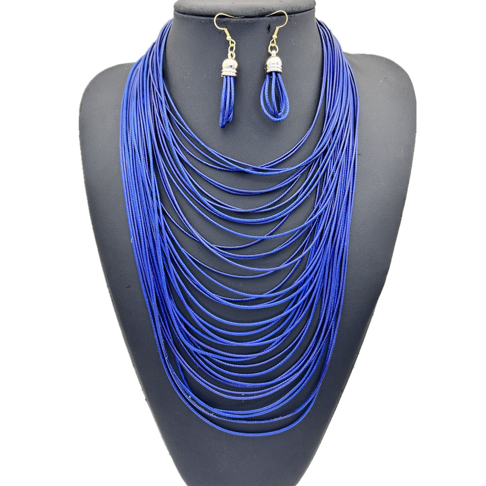 Juego de collar con borla multicapa de cordón encerado