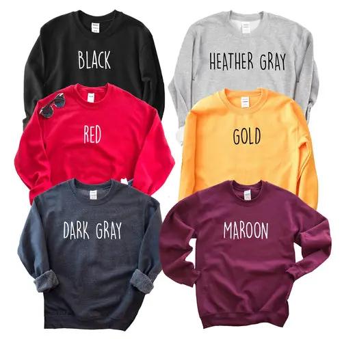 Another Fine Day Sweatshirt in six colors: black, red, dark gray, heather gray, gold, and maroon.