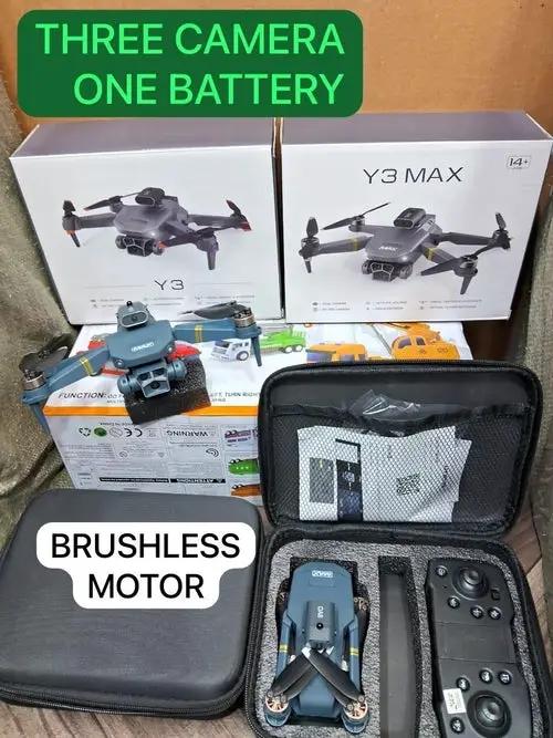 PrimeCanada.Store Drone Y3 MAXX quadcopter with three cameras and one battery; blue drone, remote, two Y3 MAXX boxes.