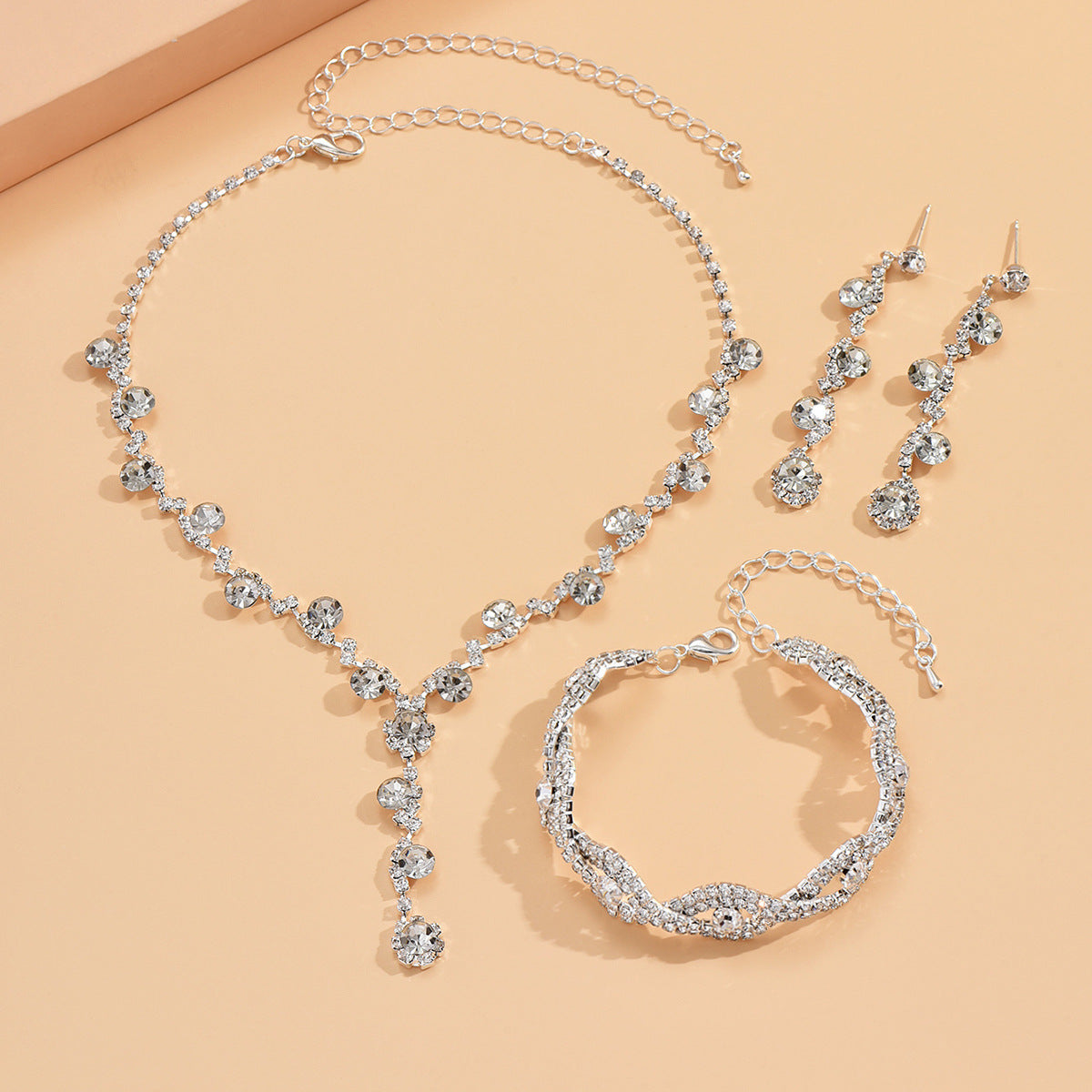 Collier en cristal, boucles d'oreilles et bracelet tendance