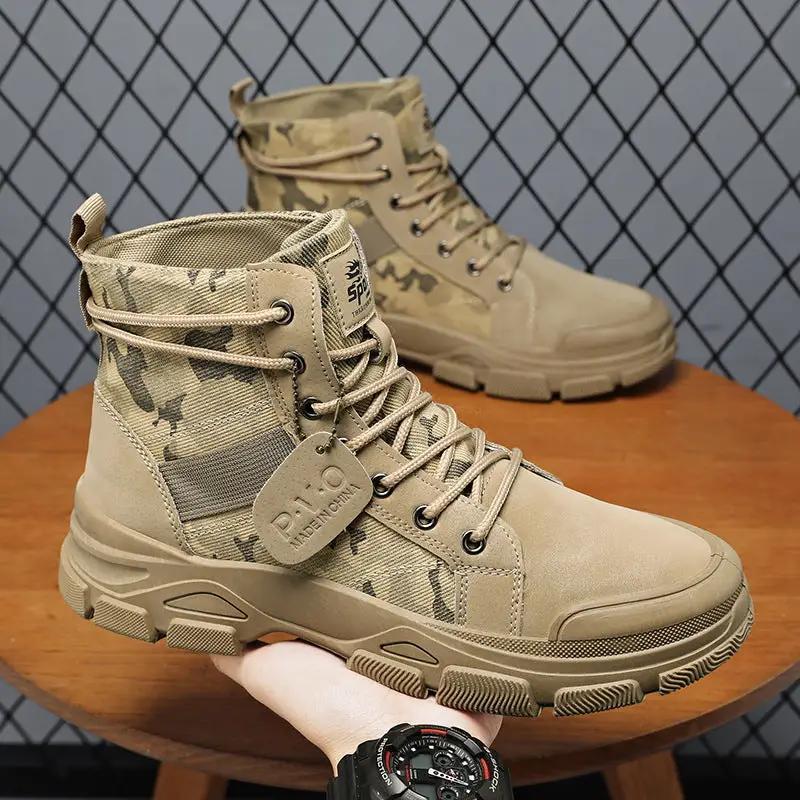 Pair of AdTec men's high-top hiking boots, tan camouflage uppers with rugged lug soles
