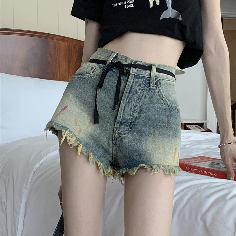 Shorts en jean vintage taille haute à bords bruts pour femme