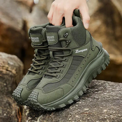 Pair of olive-green outdoor hiking boots with thick rugged soles