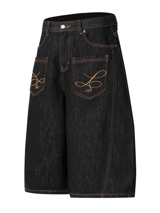 Men's wide-leg denim shorts with embroidered back pockets; black cotton-blend denim with orange stitching.