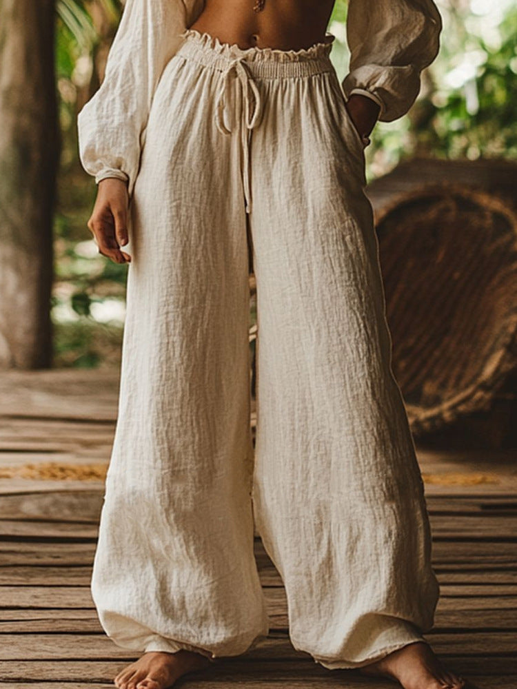 Pantalon ample décontracté de style artistique avec poches, cordon de serrage et taille élastique