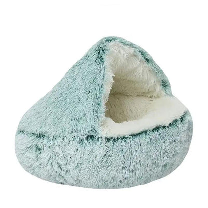 AdTec plush shell pet nest; mint green exterior with soft cream interior.