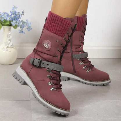 AdTec fur-integrated burgundy knee-high snow boots with knit cuff, side zipper, lace-up front, and buckle strap.