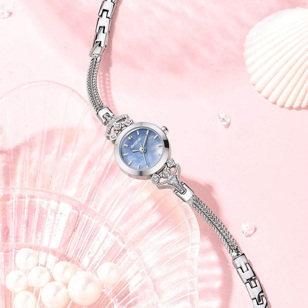Reloj de cuarzo impermeable, pequeño, exquisito y de primera calidad para mujer