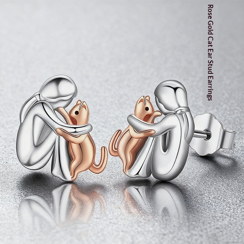 Ensemble de boucles d'oreilles Fillette et Chien s'enlaçant