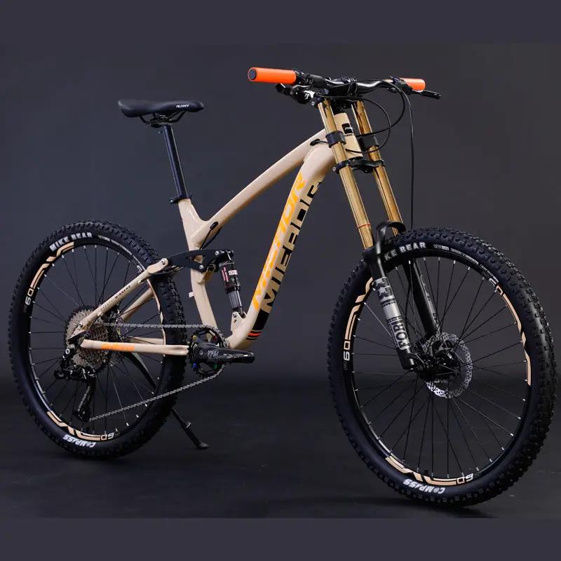 AdTec aluminum alloy mountain bike with tan frame, gold front suspension fork, orange grips