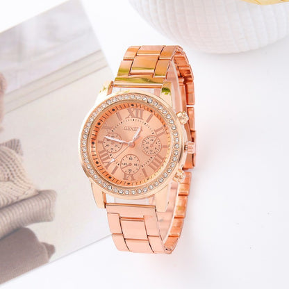 Montre à quartz dorée Genève à bracelet en acier