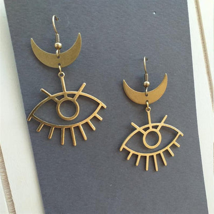 Boucles d'oreilles pendantes gothiques simples en forme de croissant et de grands yeux, très prisées