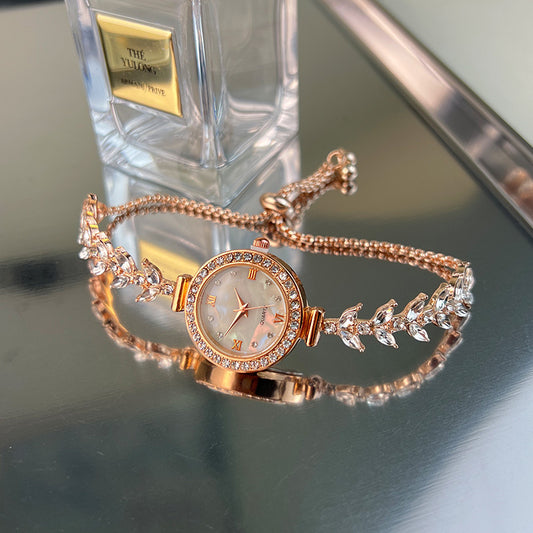Reloj de cuarzo asequible de lujo con incrustaciones de diamantes y pulsera ajustable gratis