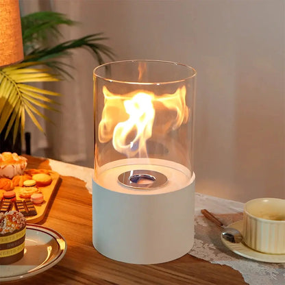 11.5-inch high tabletop fire bowl fireplace by JHY DESIGN with glass cylinder and white base