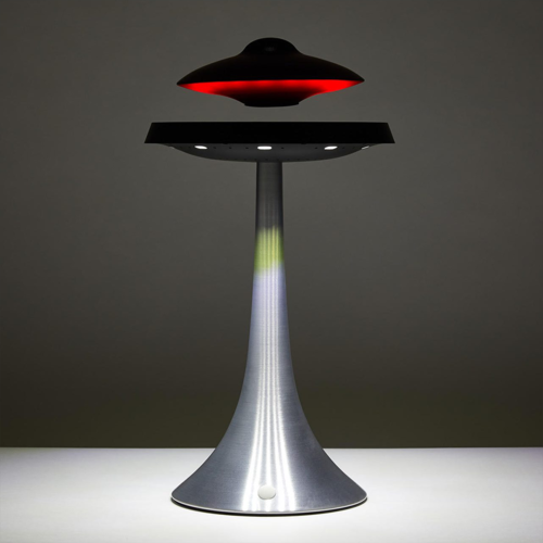 Levitating UFO Speaker by PrimeCanada.Store, silver pedestal with black disc and red glow